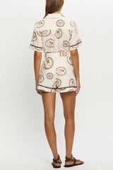 Resort Style Print Lapel Short Sleeves Casual Pocket Waist Tie Loose Rompers