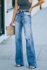 Allan High Rise Distressed 90s Flare Jeans