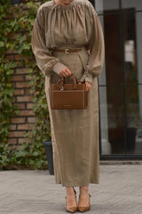 Solid Color Round Neck Long-sleeved Pleated Shirt and Elegant Maxi Skirt Set